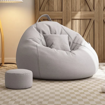 Pouf salon géant gris clair avec repose-pieds assorti